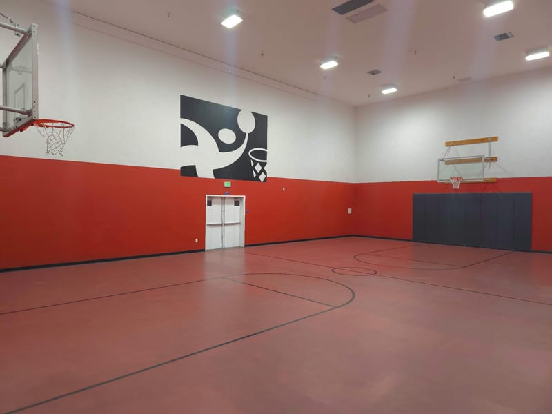 Indoor basketball court with hoops